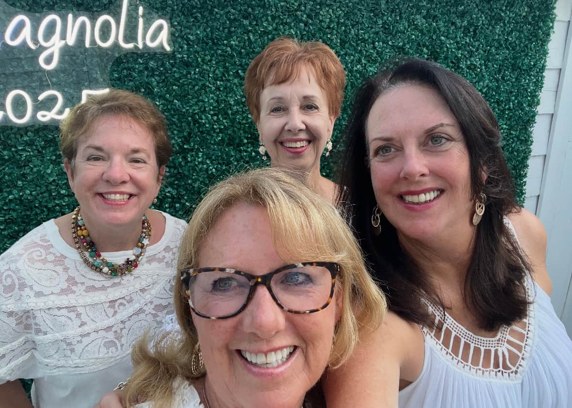 Friends dressed up and ready for a night out during a girls trip in Galveston