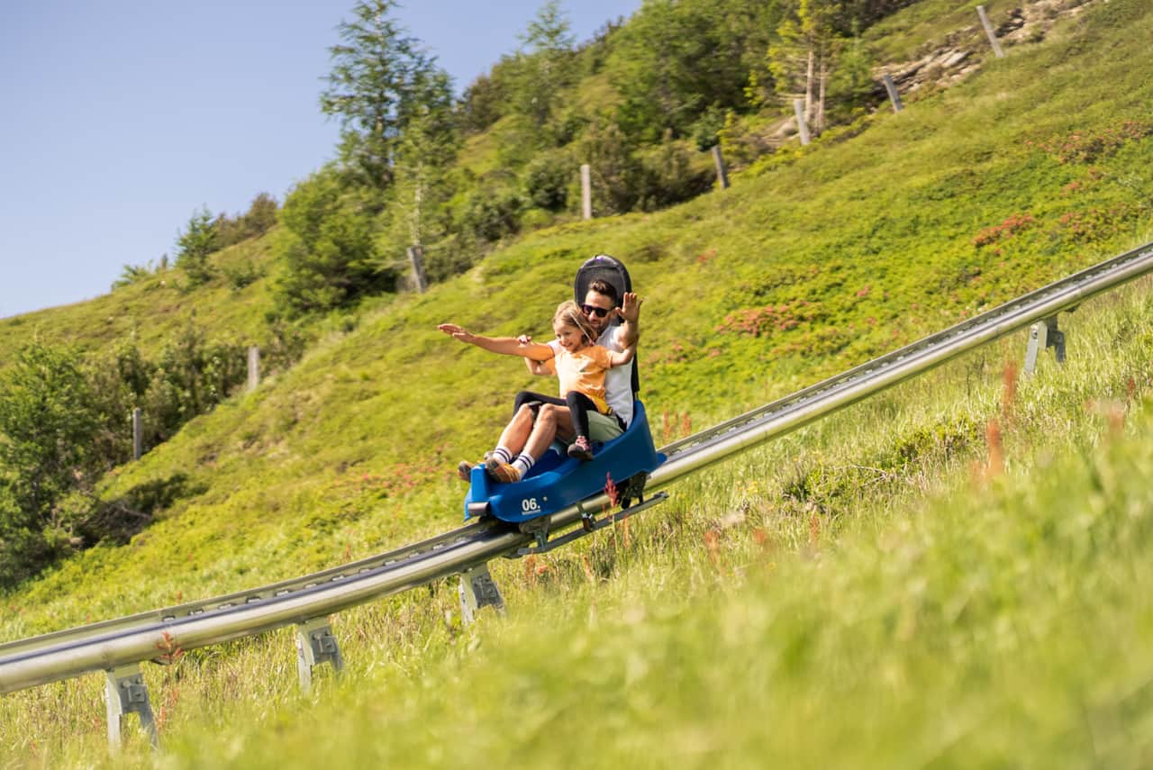 Summer sledding fun – the Rosskopf alpine coaster offers action, views, and fun for all ages!
