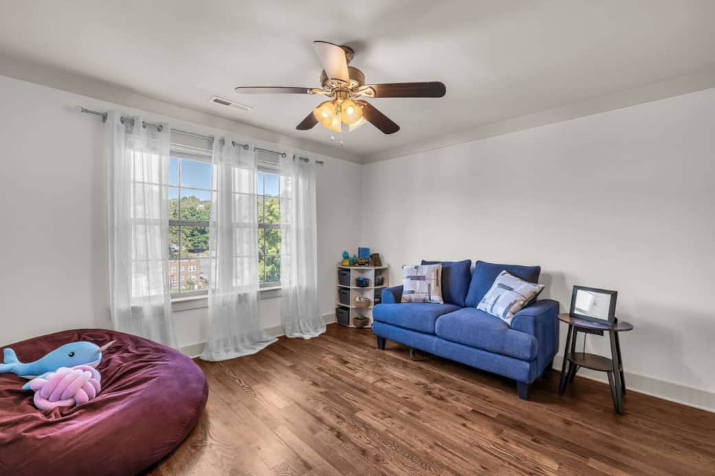 Open landing at the top of the stairs provides an additional space for everyone to spread out.
