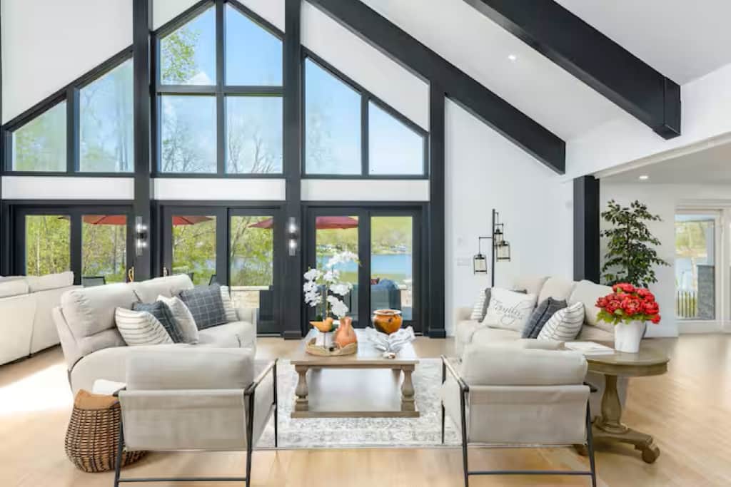 Gorgeous and comfortable seating area with reclining sofas and water views.