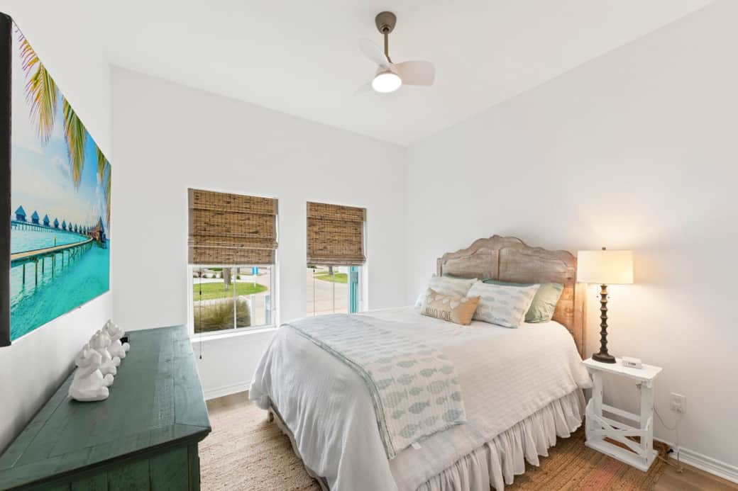 Bedroom 1: Queen bed, TV, closet, bathroom with shared access to the hallway
