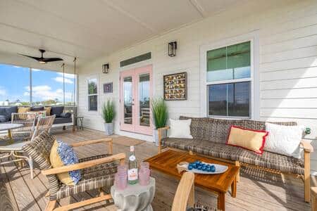 French doors beckons to the screened-in porch just beyond w indoor outdoor entertaining.