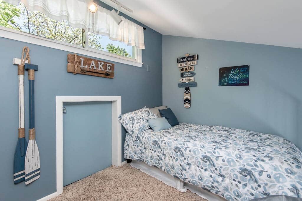Loft bedroom with a twin bed that overlooks the master bedroom.