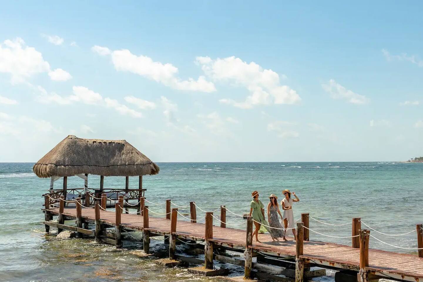 Stroll into coastal tranquility on the charming beach pier, nestled beside the vibrant beach club. Experience the allure of gentle waves beneath your feet as you enjoy a leisurely walk by the water's edge.