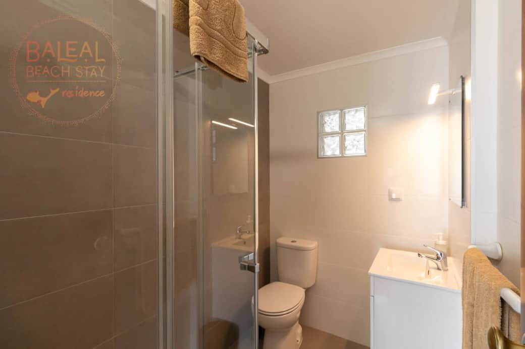 Enjoy your private bathroom  with modern fixtures, spacious shower, fresh towels, and essential toiletries. Bright, clean, and comfortable—perfect for starting or ending your day after surfing ‍♂. Offers privacy, convenience, and relaxation
