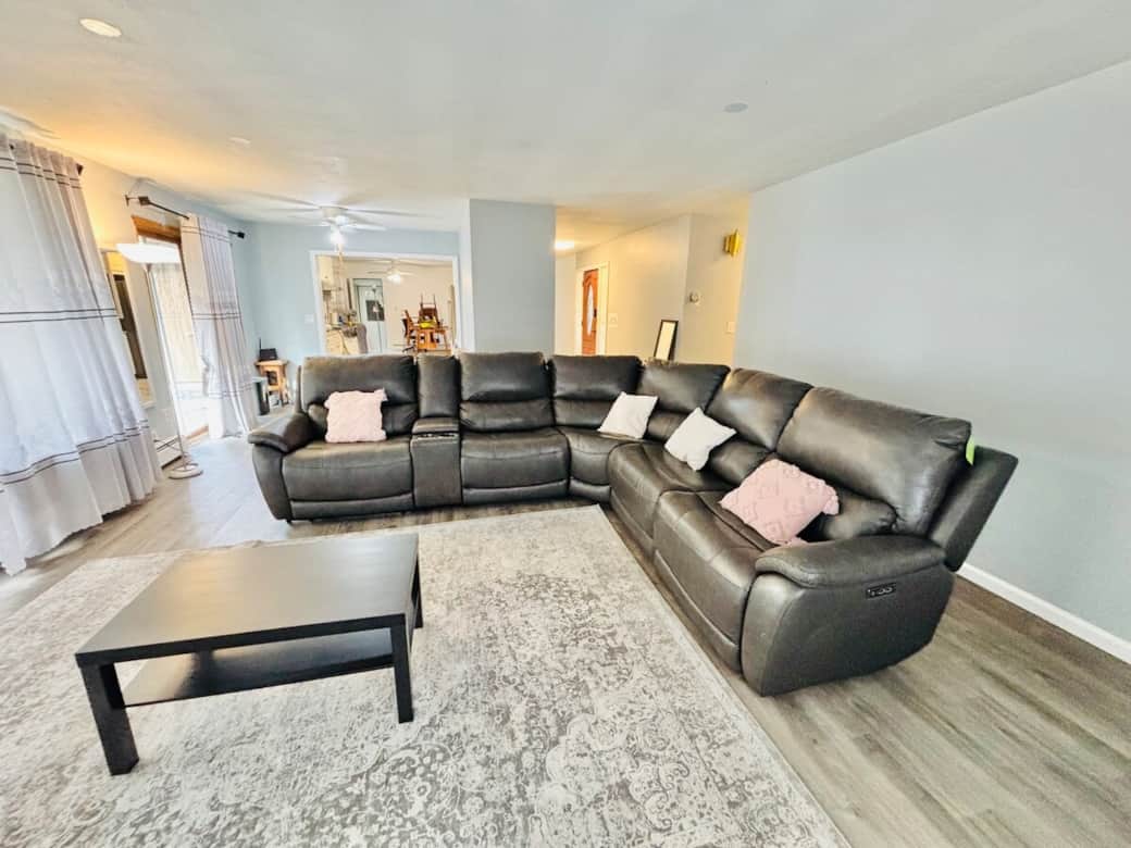 Open concept living area that flows into kitchen. Open concept living area that flows into kitchen.