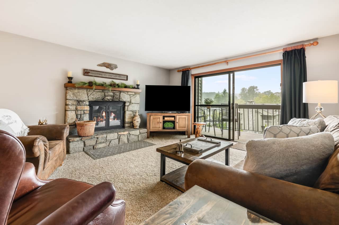 Relax by the fire or open the sliders for tennis-court and mountain views.  