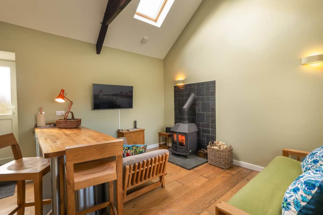 Wood stove - a basket of wood will be provided
42" TV with streaming capabilities.
Netflix provided
2 x wooden bar stools