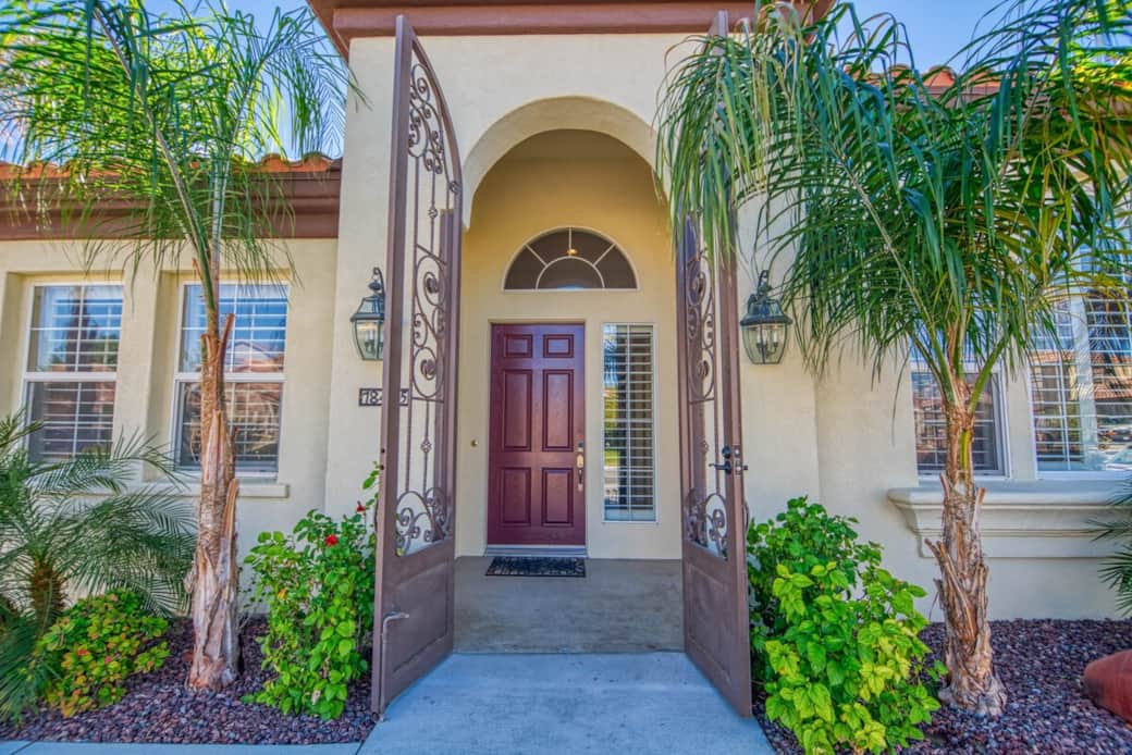 An ornate iron front gate welcomes you to the start of your getaway. An ornate iron front gate welcomes you to the start of your getaway.