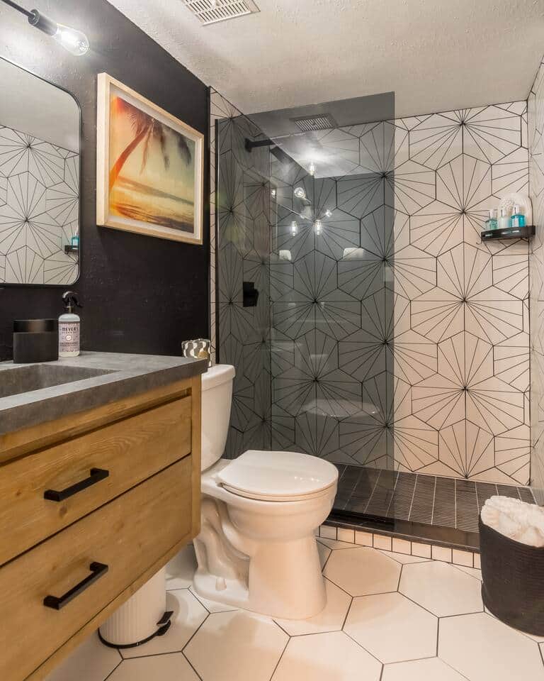 Playful and tastefully modern bathroom with full size walk in shower and all the essentials