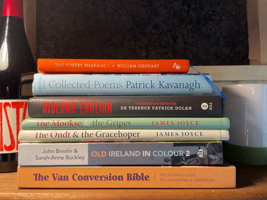 A bookshelf filled with classics, poetry, and local tales to enhance your retreat