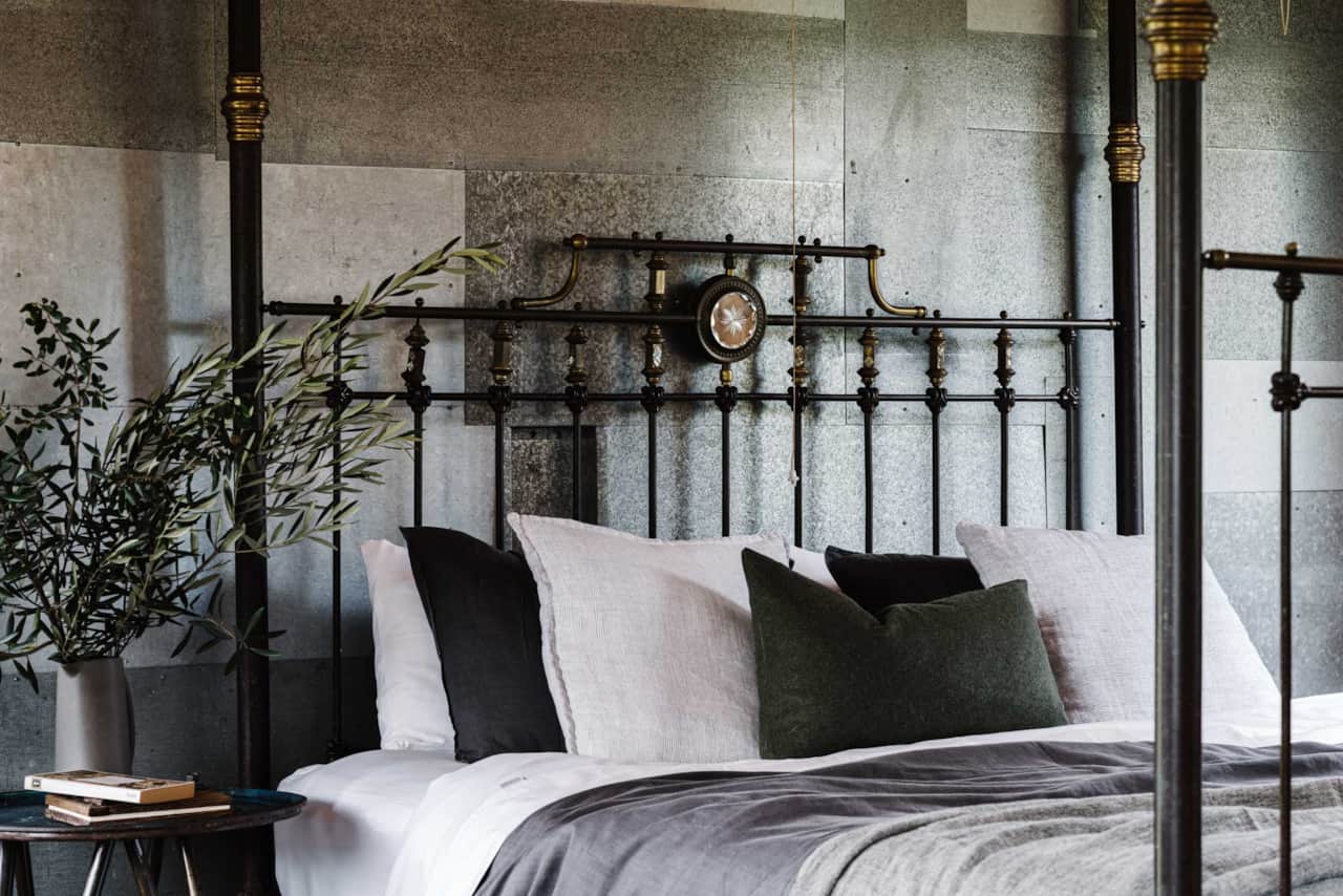 Liptrap Loft cast-iron bed, Dutch colonial antique from Jakarta, Suharto era. Walkerville VIC.