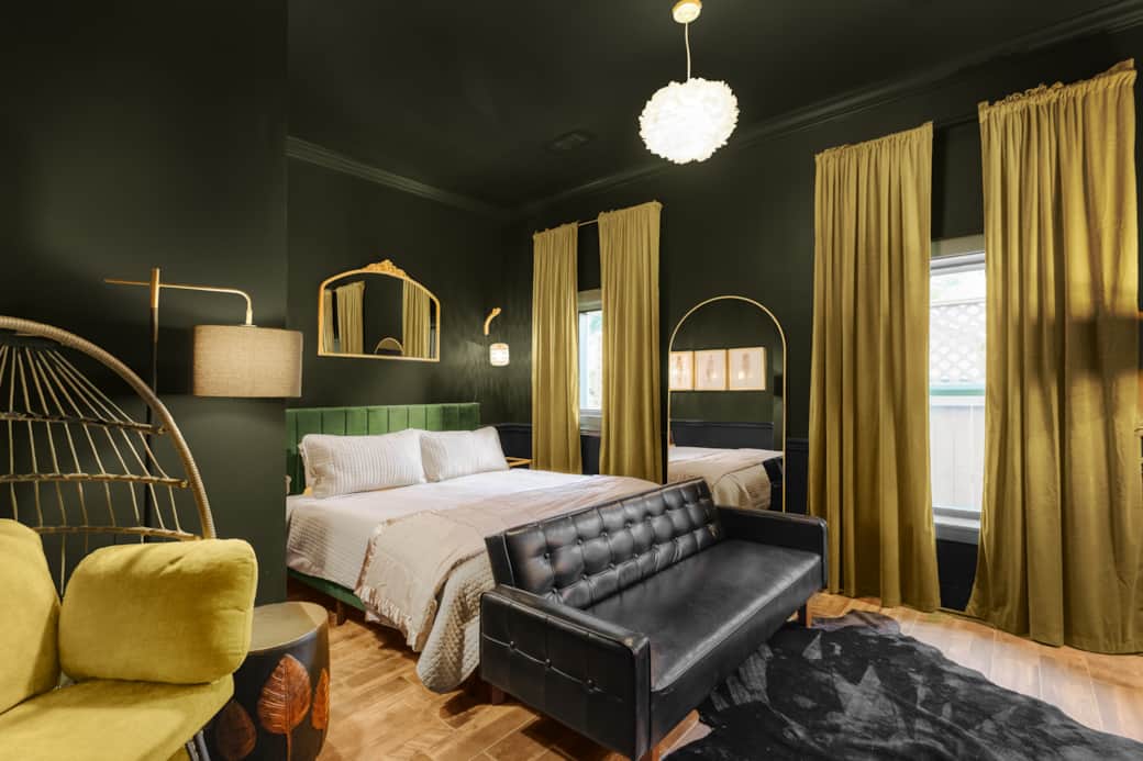 King sized bed with premium bedding, down feather topper, one of the two sofa sleepers and fireplace