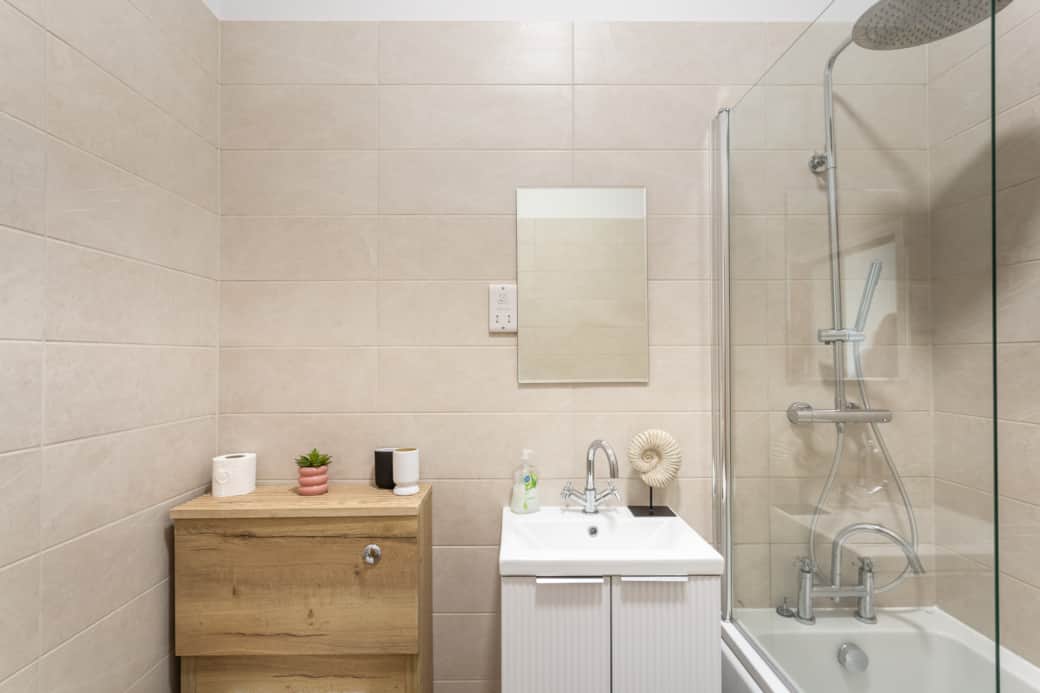 Full Bathroom with shower over bath Full Bathroom with shower over bath