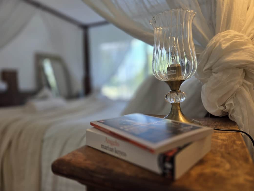 Retreat to our serene, romantic bedroom sanctuary with a stunning four-poster canopy bed.