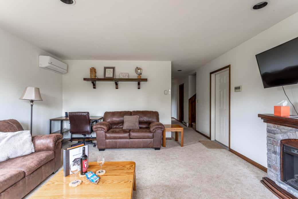 Living Room with Office Space and Electric Fireplace