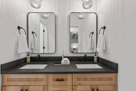 2nd floor bathroom, with two sink vanity, and tub/shower combo