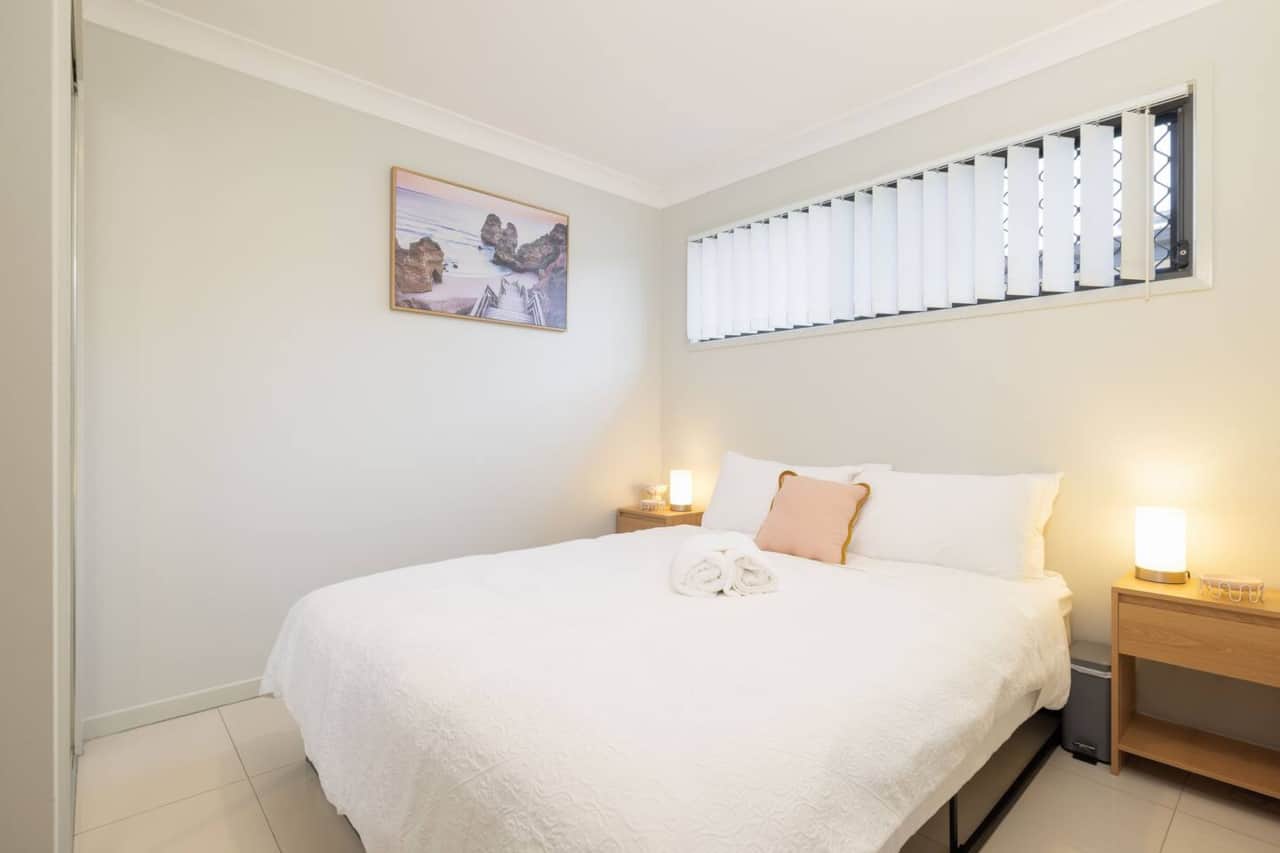 Bedroom 1: Peaceful bedroom with cozy design and ample storage