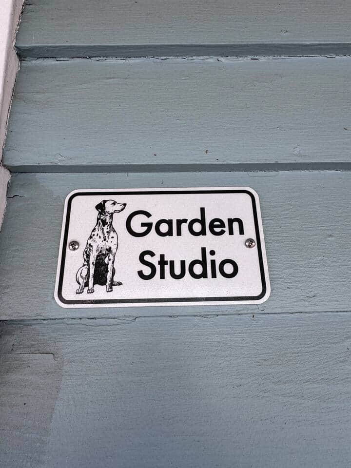 Sign showing the “Garden Studio”. We are dog friendly. 