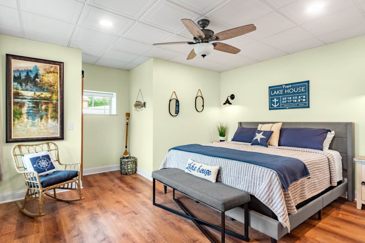 Lower level king bedroom has stunning lake views