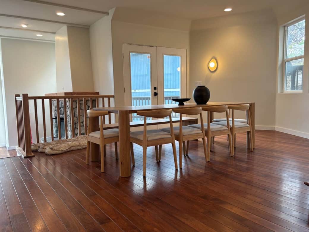 96" oak dining table, with 6 chairs and full length matching oak bench to seat 10 comfortably. Two additional upholstered chairs are provided in case you have a party of 12.