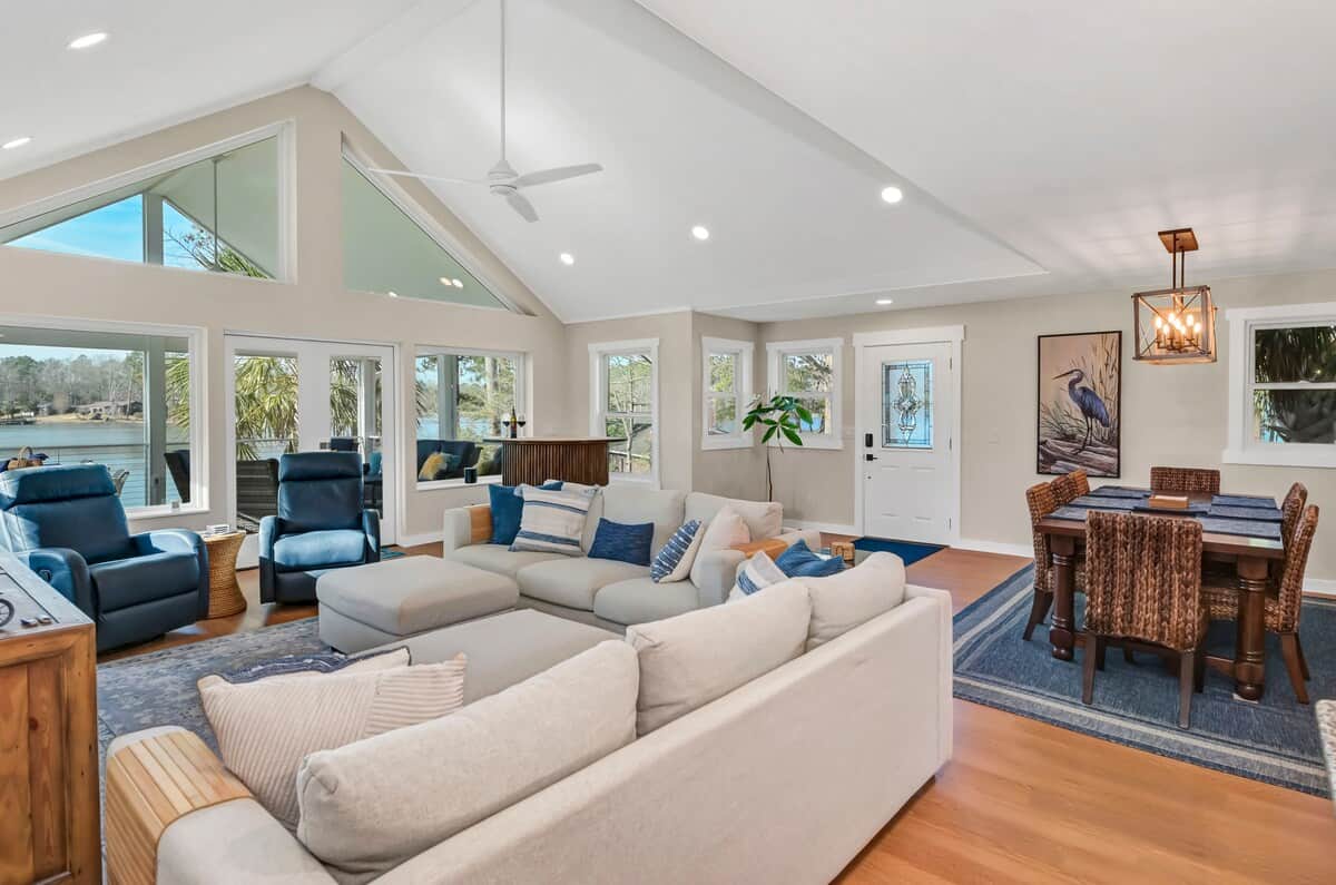 Great room with double doors to screened-in porch