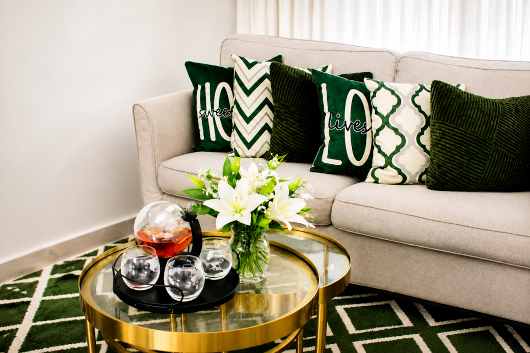 Bright modern living room with smart TV, plush seating, and elegant décor.
