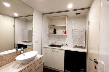 Laundry within the bathroom. 8kg/5kg Front Load Washer Dryer Combo.