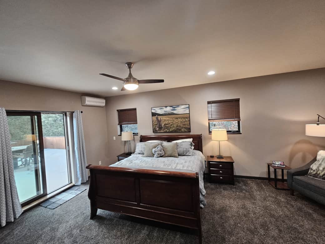 Master Suite offers private balcony with river views and a reading nook