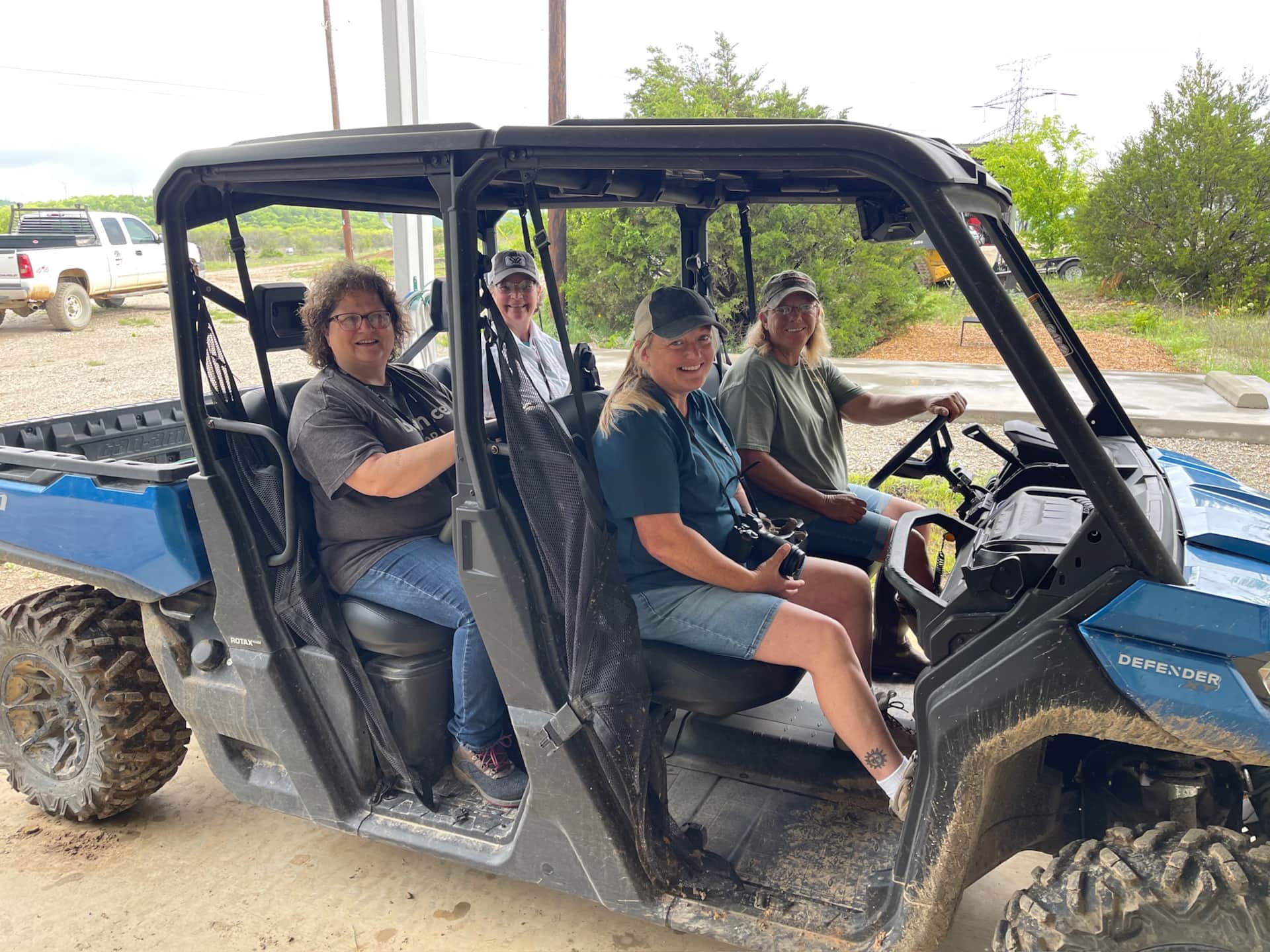 Family exploring Lake Godstone’s forested trails by UTV during a private Texas family reunion near Graford