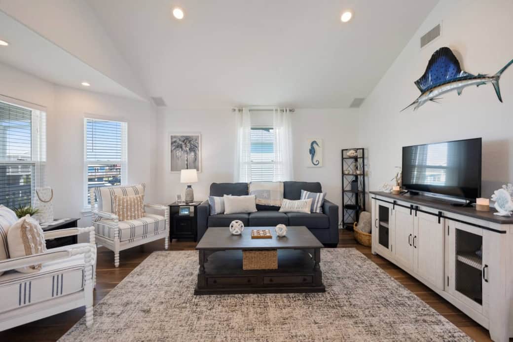Spacious family room with high ceilings.