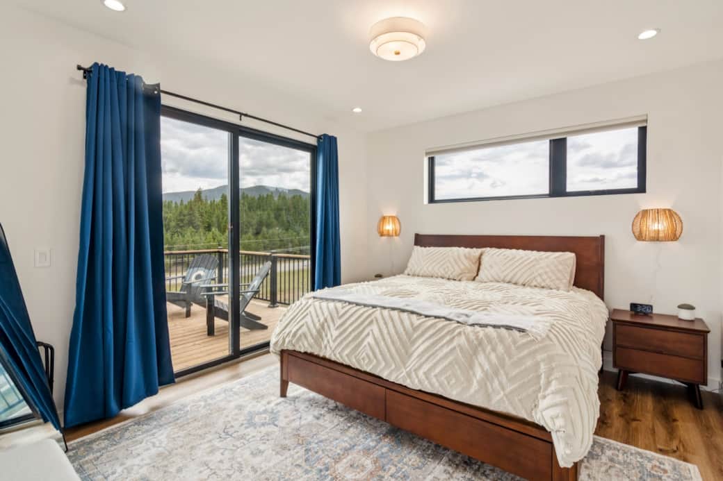 Master king bedroom - deck access, private bath, clothing storage Master king bedroom - deck access, private bath, clothing storage