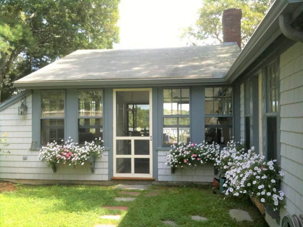 Drive down a winding driveway - the house sits on a 1.5 acre lot