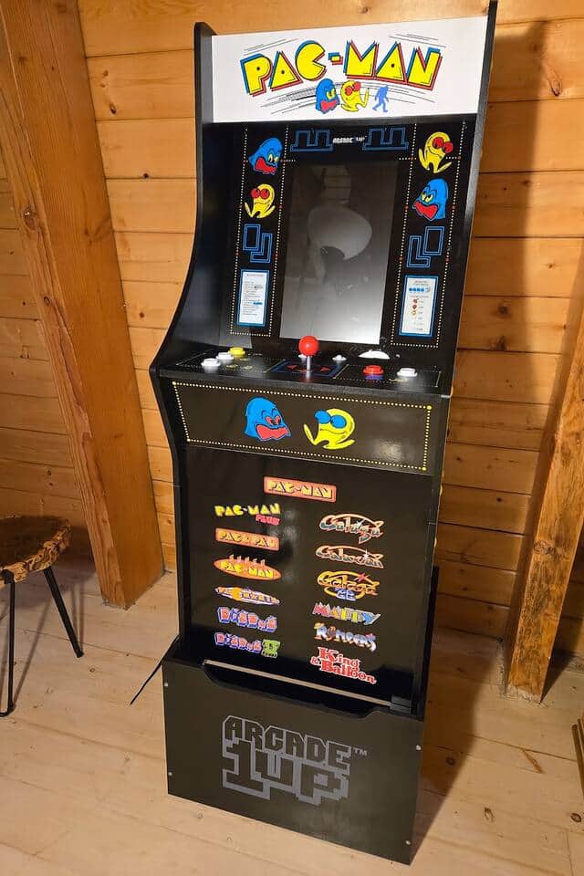 Beat your high score on the arcade game console in the game room!