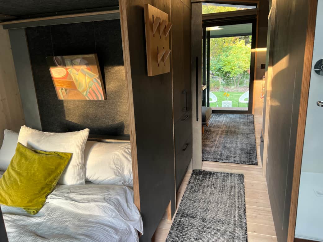 Comfortable, cozy yet spacious queen sized sleeping nook, with shelf, storage, usb at headboard