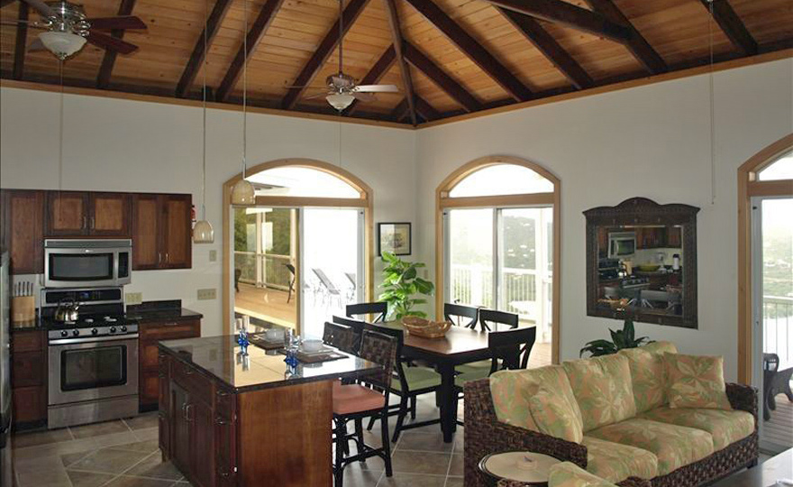 Open plan living area adjoining kitchen and indoor dining