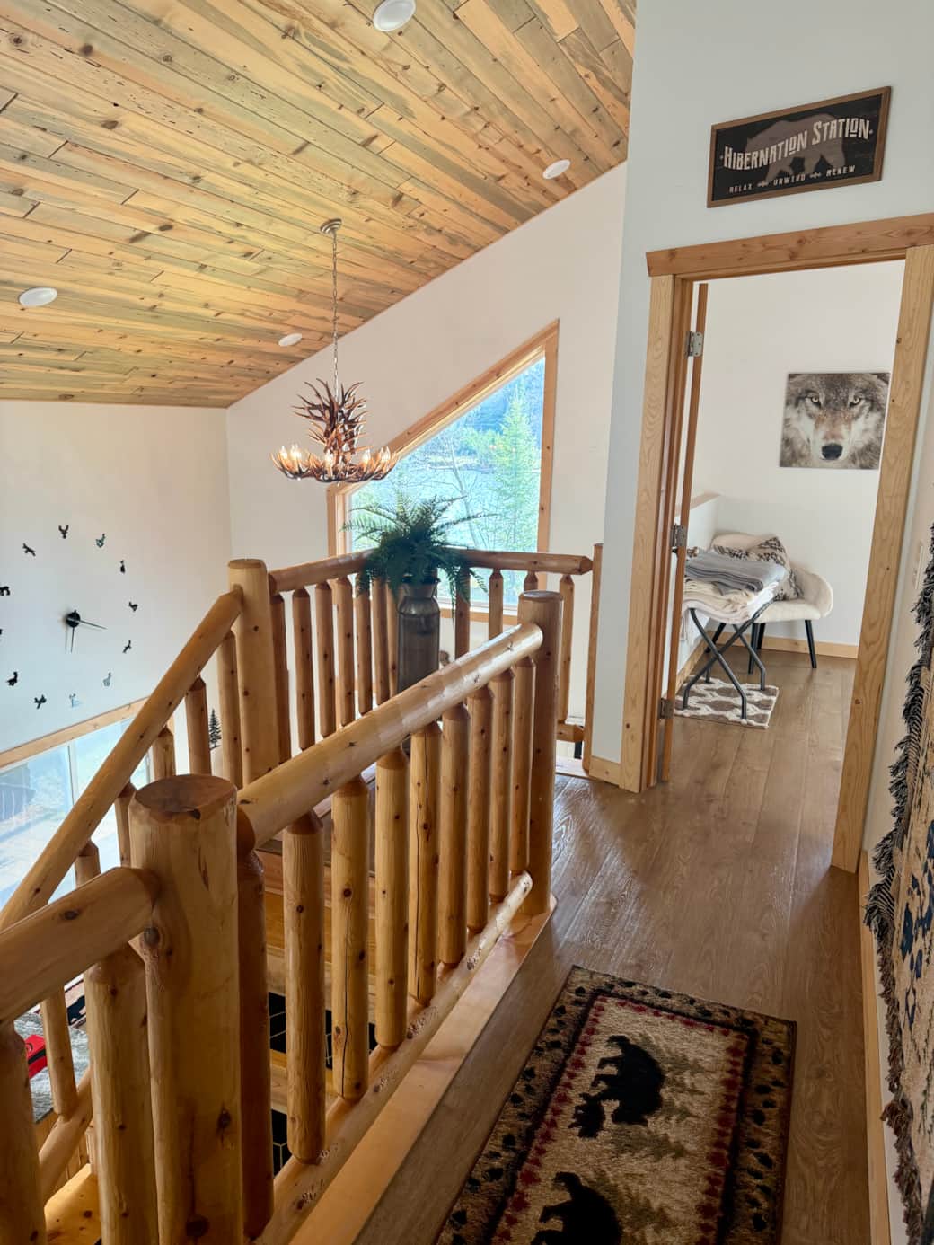 Upstairs walkway between the lofted master suite and queen back bedroom