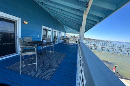 Coastal blue outdoor of house and decks