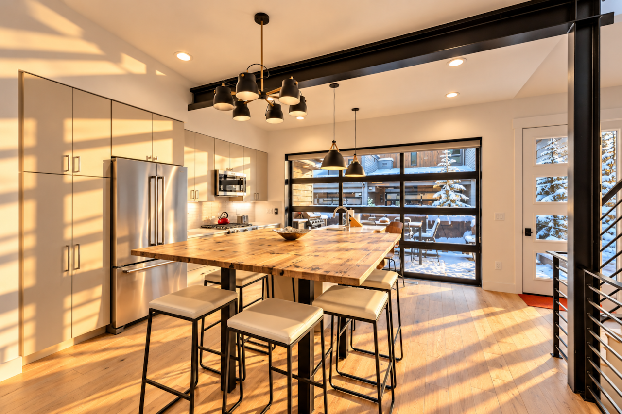 Fully stocked kitchen with garage door that opens to the balcony