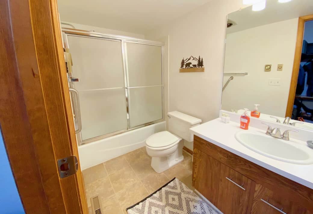 Full bathroom located just outside bedroom #1.