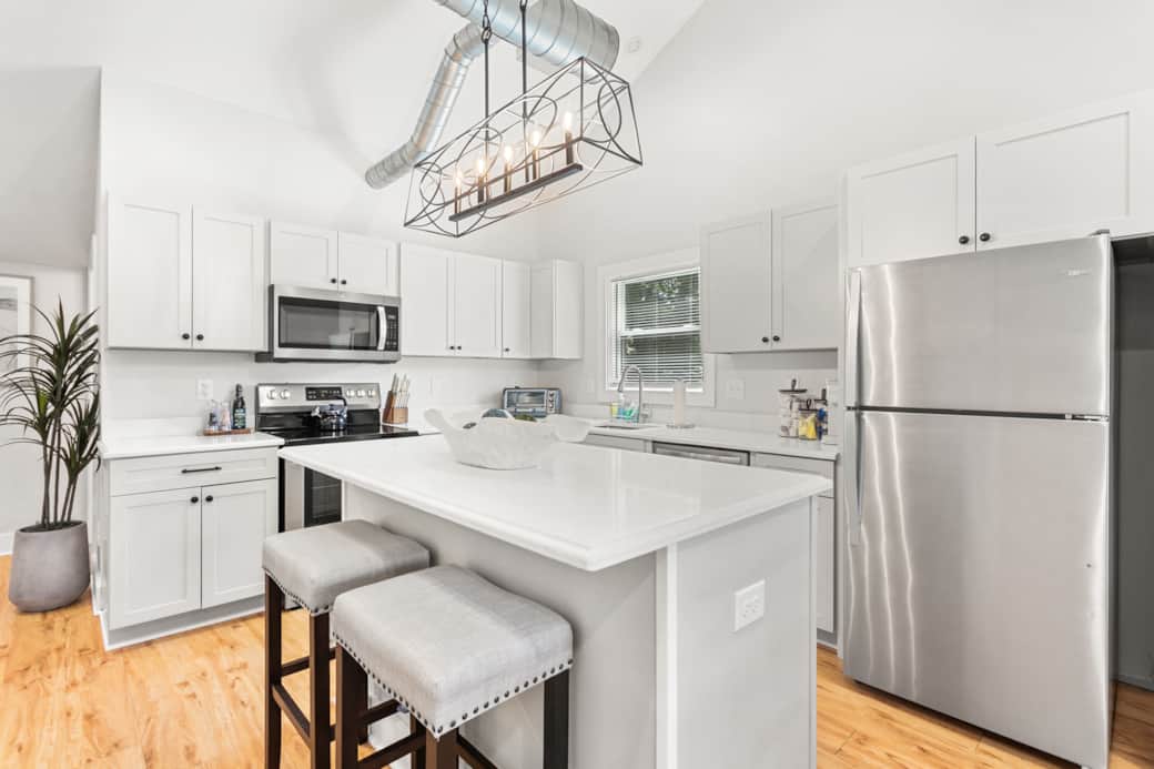 Full Kitchen with Plenty of Bar Seating and Prep Space