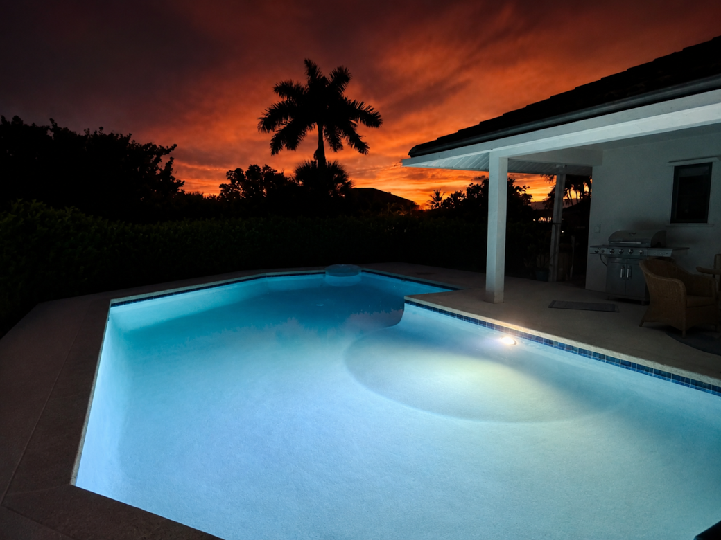 Relax poolside with peaceful waterfront views and unforgettable Florida sunsets. Relax poolside with peaceful waterfront views and unforgettable Florida sunsets.