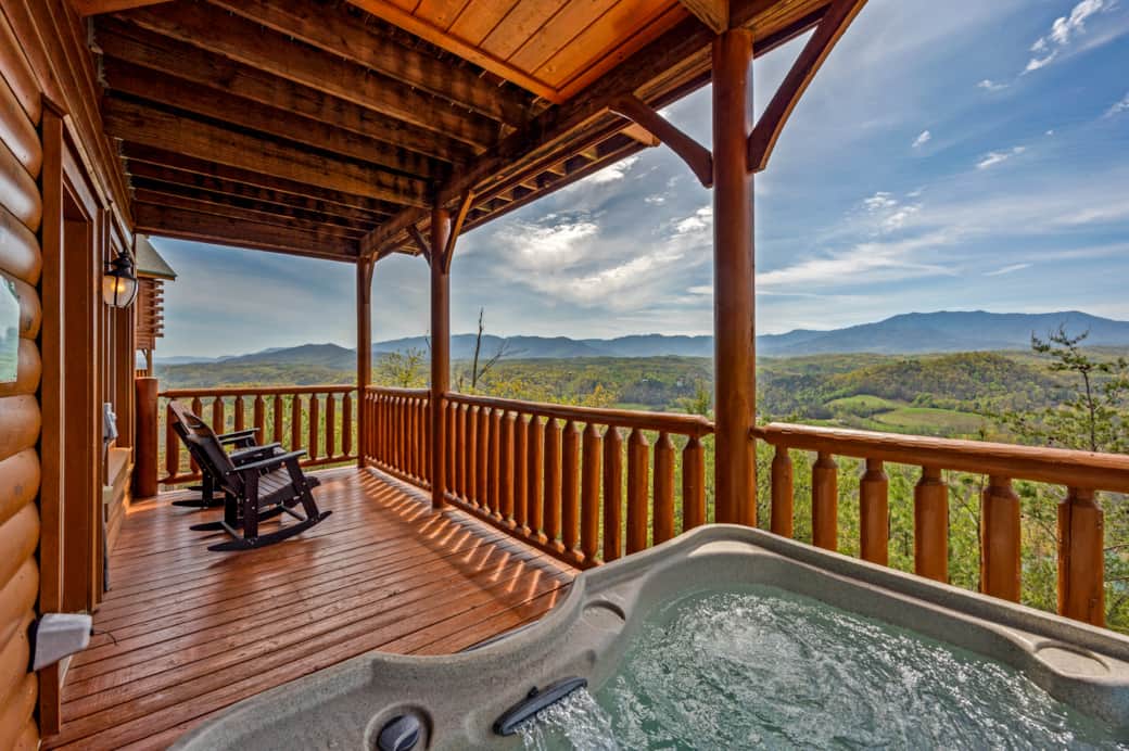 Relax in the hot tub while taking in sweeping mountain views