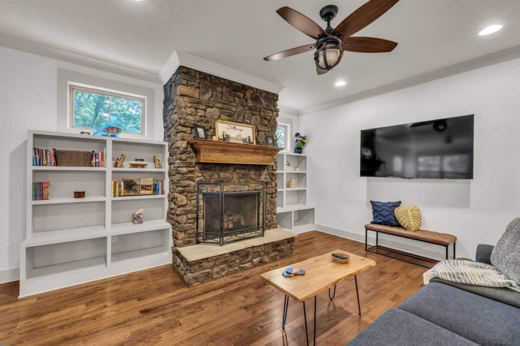 Grab a book and curl up on the couch or put your favorite show or team on the 65" Roku TV. (Please note: fireplace is not functional at this time.)