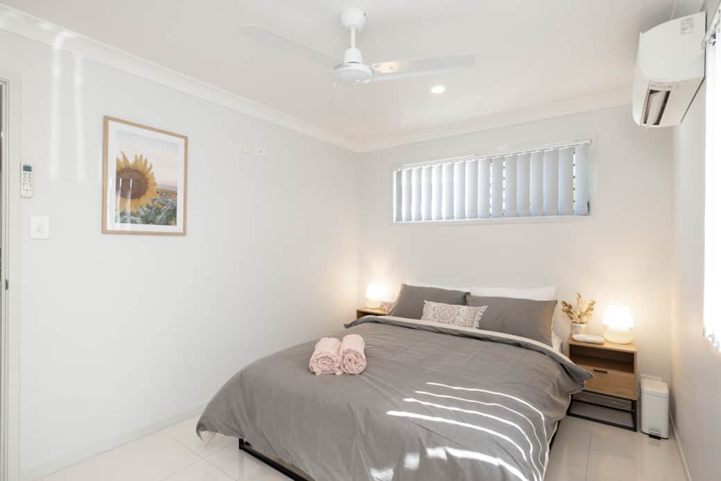 Bedroom: Peaceful bedroom with cozy design and ample storage 