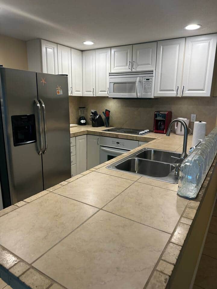 Kitchen with all standard size appliances.