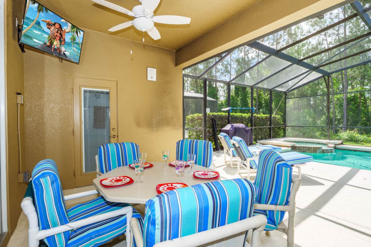 This screened area offers shelter from the sun for al fresco dining