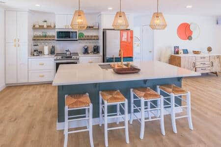 Custom Kitchen: The heart of the home is the modern appliance and bar to share all the good times! 