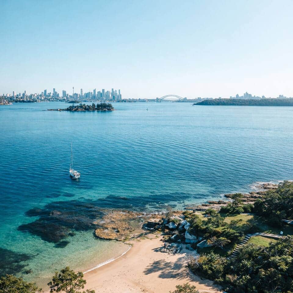 Discover Milk beach 
Secluded harbour sands with uninterrupted views to the Sydney skyline  calm, private, and effortlessly beautiful