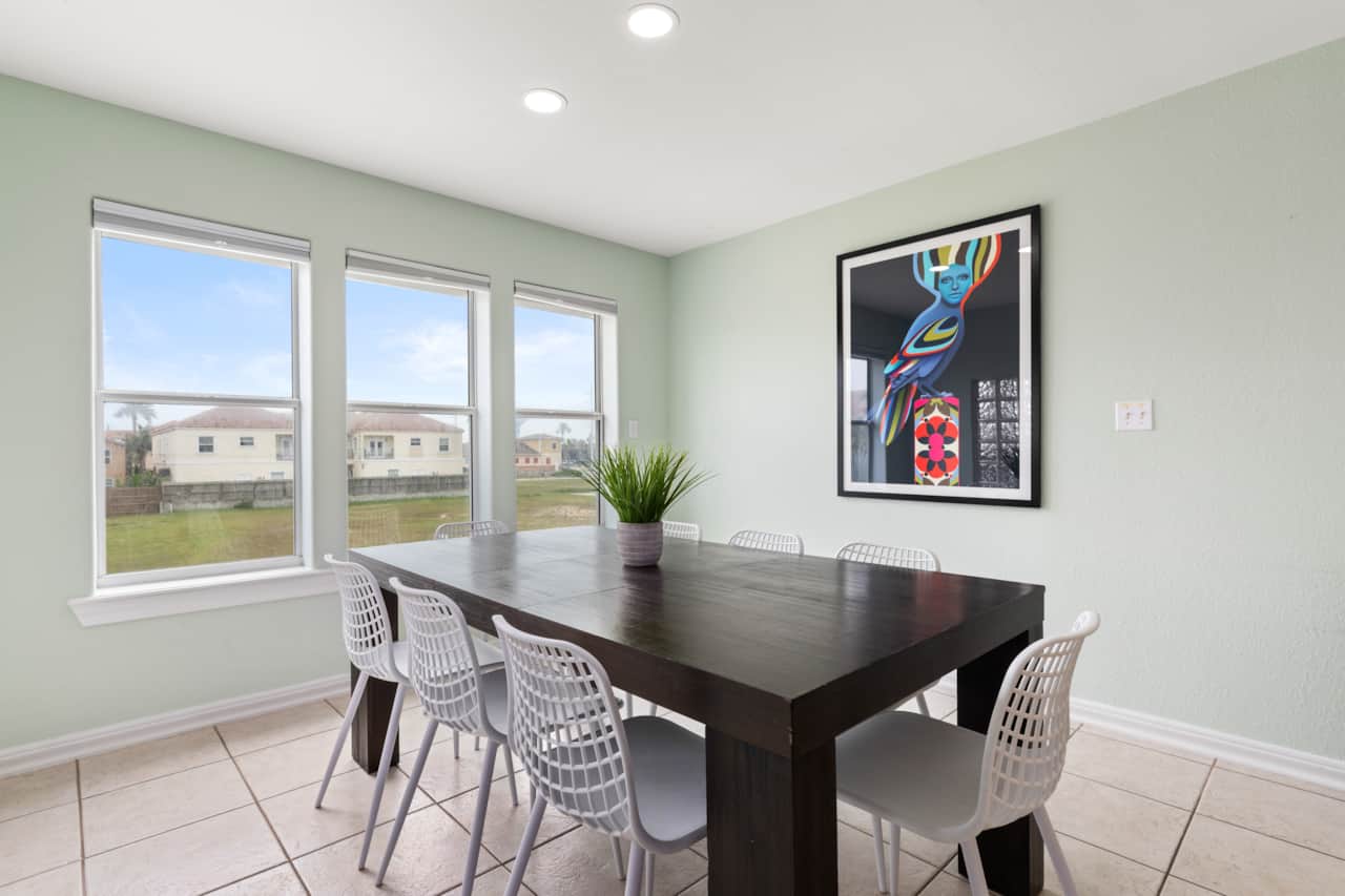 Dining area; sunny, bright modern and fresh feel.